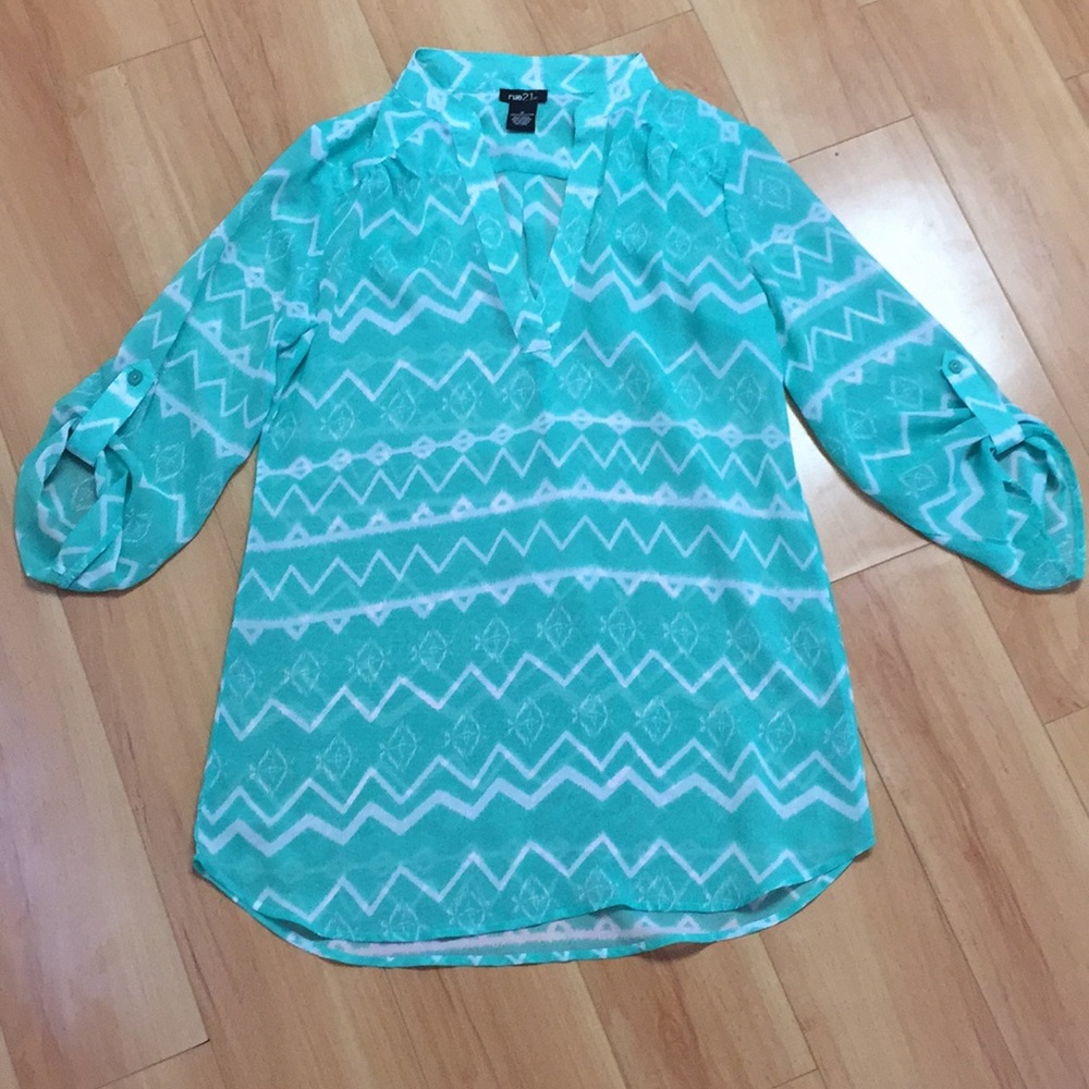 White and teal with Aztec design